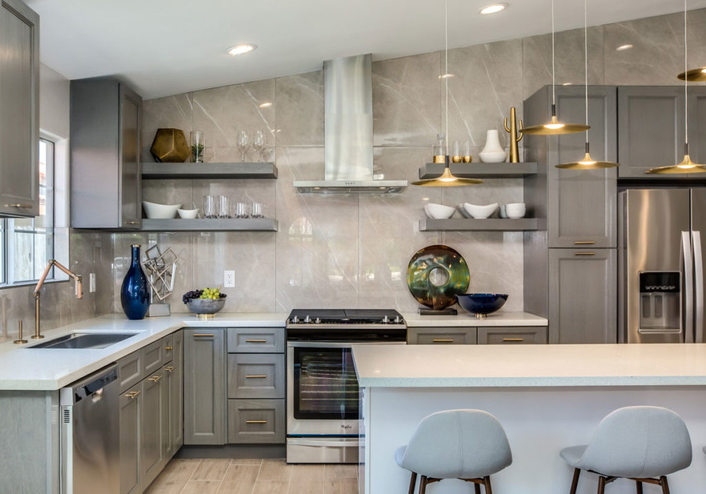 Grey shaker kitchen cabinets with quartz countertops by Gold Cabinets & Countertops